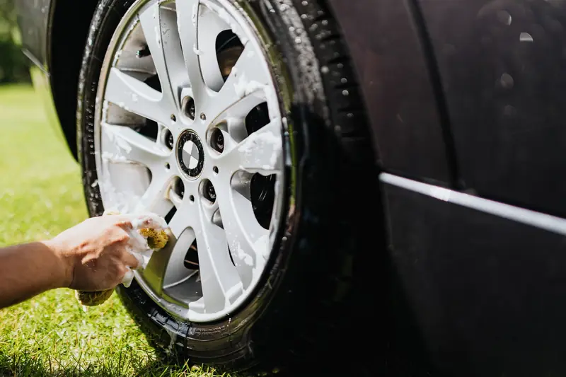 Close view of a wheel being washed